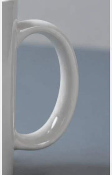 Enlarged crop of the handle in the AI desk scene