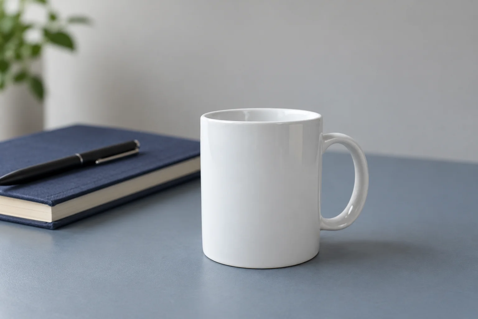 AI-edited scene of the same reference mug on a blue-gray desk beside a dark notebook and pen