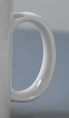 Handle crop from the white source mug